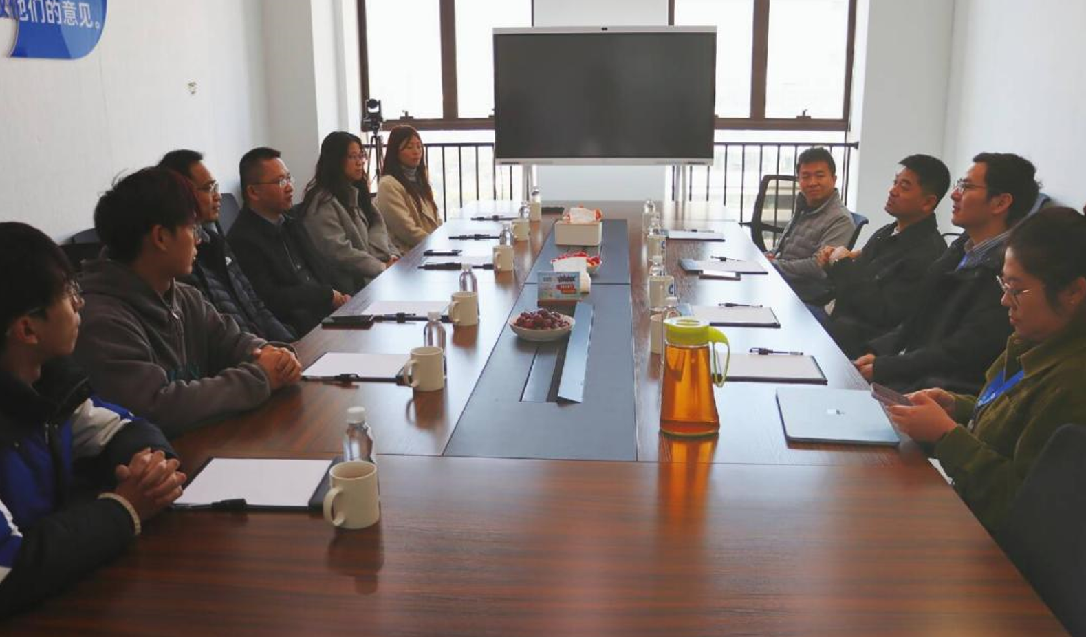 20260118学院师生与企业座谈会现场.png