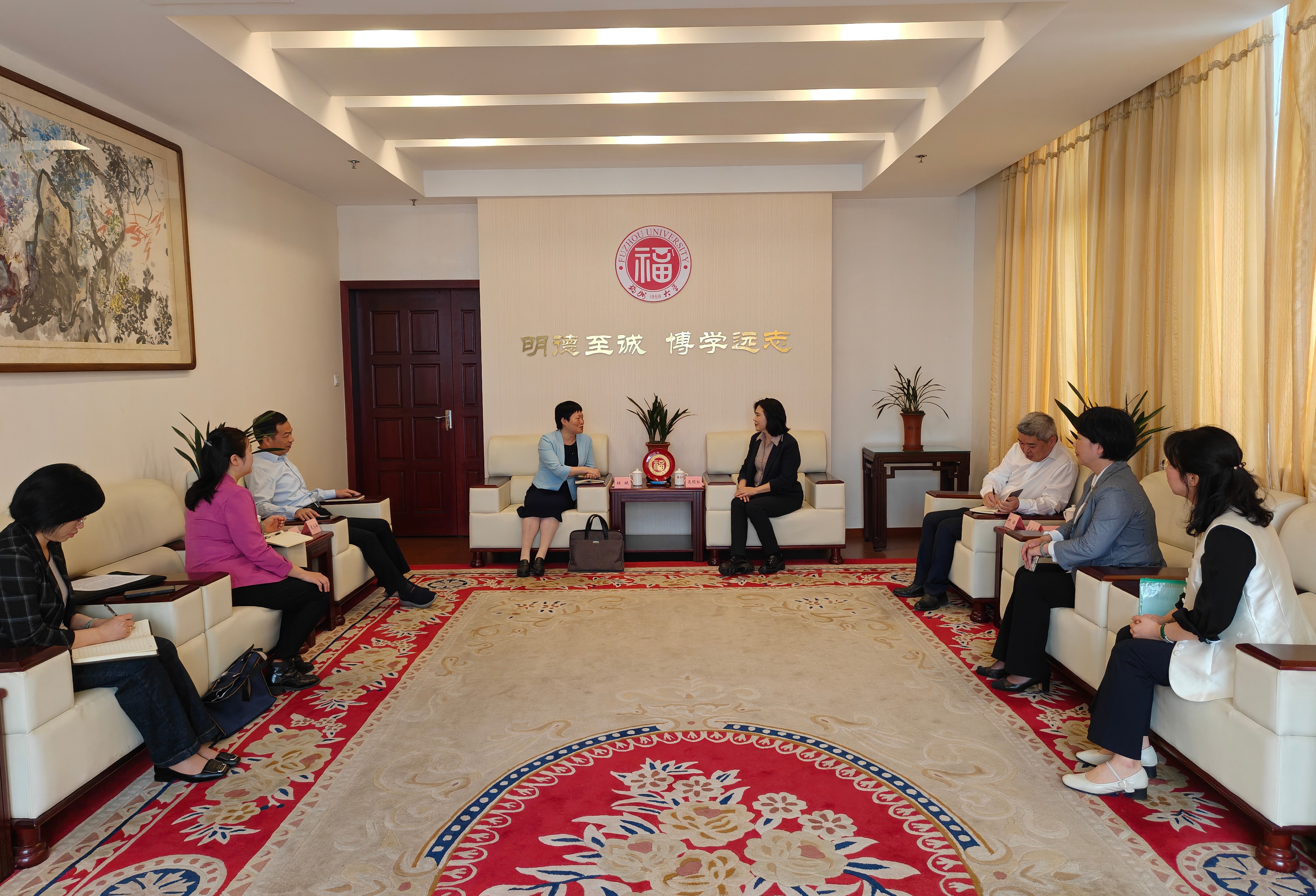 20250417吴明红校长会见林斌主任统战部.jpg