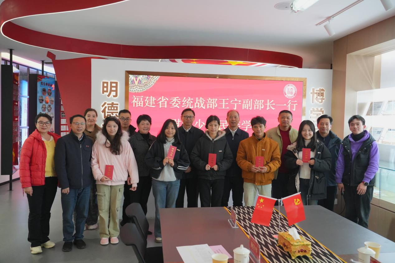 20260128学生工作部（处）+王宁部长一行合影留念.png